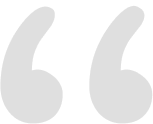 Stylized light-gray opening double quotation marks centered on a plain white background. Transcribed text: ““
